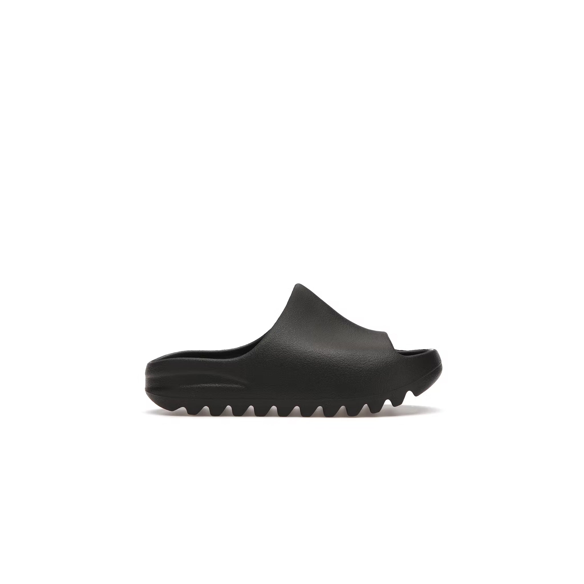 Side view of Adidas Yeezy Slide Kids Onyx HQ4115